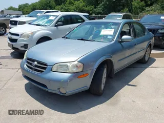2001 Nissan Maxima GXE with VIN JN1CA31D51T604935, listed as a IAAI auction lot 42504918 with 253,407 mi miles and . Bid and sale history available at DreamBid. Image 2.