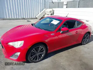 2013 Scion FR-S with VIN JF1ZNAA10D2708478, listed as a IAAI auction lot 42093210 with 172,034 mi miles. Bid and sale history available at carsss.com. Image 2.