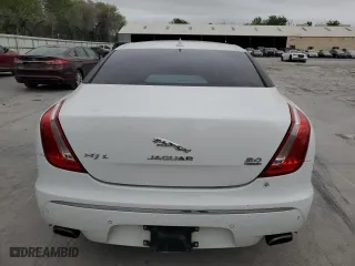 2014 Jaguar XJ with VIN SAJWJ2GD6E8V65987, listed as a Copart auction lot 50091105 with 136,080 mi miles and Clean Title. Bid and sale history available at carsss.com. Image 6.