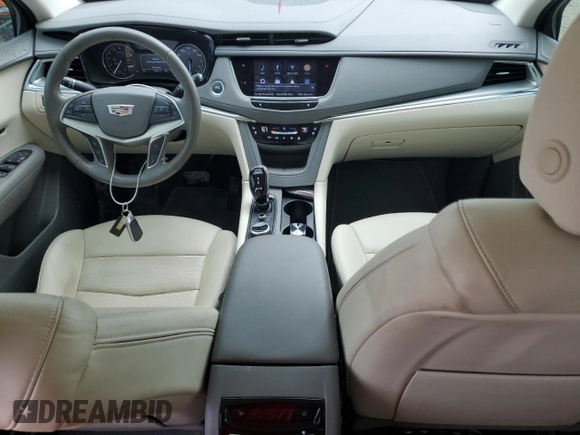 2022 Cadillac XT5 FWD Premium Luxury z VIN 1GYKNCRS0NZ175748, wystawiony jako Copart lot #61651885 z przebiegiem 13 747 mil mil oraz Szkoda całkowita • Salvage title. Historia ofert i sprzedaży dostępna na DreamBid. Obrazek 8.