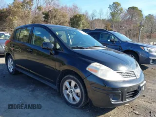 2009 Nissan Versa 1.8 S with VIN 3N1BC13E79L406888, listed as a IAAI auction lot 41573635 with 181,415 mi miles. Bid and sale history available at carsss.com. Image 1.