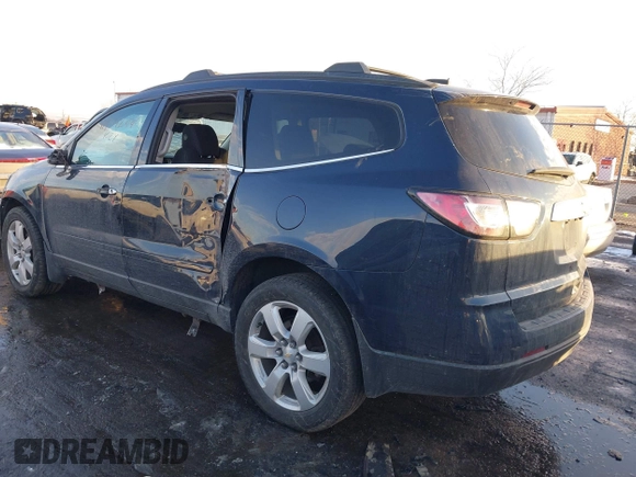 2016 Chevrolet Traverse LT with VIN 1GNKRGKD9GJ301823, listed as a IAAI auction lot 41374254 with 145,235 mi miles and . Bid and sale history available at DreamBid. Image 3.