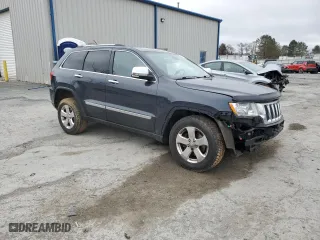 2013 Jeep Grand Cherokee Limited with VIN 1C4RJFBG1DC638845, listed as a Copart auction lot 50004015 with 109,941 mi miles and Salvage Title. Bid and sale history available at carsss.com. Image 4.