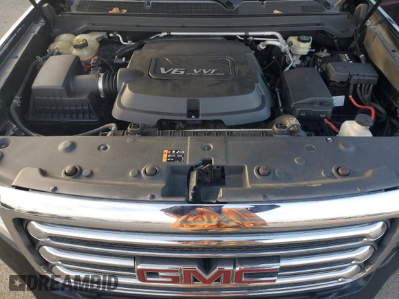 2015 GMC Canyon 4WD SLT z VIN 1GTG6CE34F1121540, wystawiony jako Copart lot #86190774 z przebiegiem 141 381 mil mil oraz Czysty tytuł • Clean title. Historia ofert i sprzedaży dostępna na DreamBid. Obrazek 11.