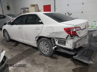 2014 Toyota Camry L with VIN 4T1BF1FK4EU763009, listed as a IAAI auction lot 41615134 with 165,293 mi miles and . Bid and sale history available at carsss.com. Image 6.