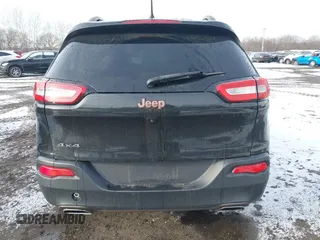 2016 Jeep Cherokee Latitude with VIN 1C4PJMCS1GW326557, listed as a IAAI auction lot 41474801 with 207,805 mi miles. Bid and sale history available at carsss.com. Image 16.