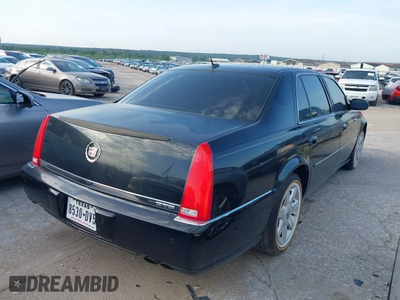 2006 Cadillac DTS w/1SC with VIN 1G6KD57Y26U156907, listed as a IAAI auction lot 42101639 with 188,886 mi miles. Bid and sale history available at carsss.com. Image 4.