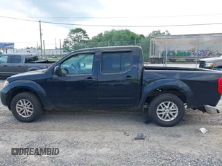 2015 Nissan Frontier S with VIN 1N6AD0EV2FN735908, listed as a IAAI auction lot 42388456 with 164,889 mi miles and . Bid and sale history available at DreamBid. Image 14.
