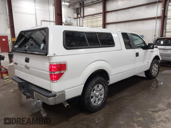 2011 Ford F-150 XL with VIN 1FTFX1CT4BFB57922, listed as a IAAI auction lot 42040372 with 99,027 mi miles and . Bid and sale history available at DreamBid. Image 4.