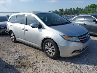 2014 Honda Odyssey EX-L z VIN 5FNRL5H66EB136355, wystawiony jako IAAI lot #42274121 z przebiegiem 126 835 mil mil oraz . Historia ofert i sprzedaży dostępna na DreamBid. Obrazek 1.