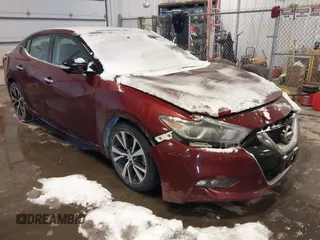 2016 Nissan Maxima Platinum z VIN 1N4AA6AP0GC434577, wystawiony jako IAAI lot #41587732 z przebiegiem 188 818 mil mil oraz . Historia ofert i sprzedaży dostępna na DreamBid. Obrazek 1.