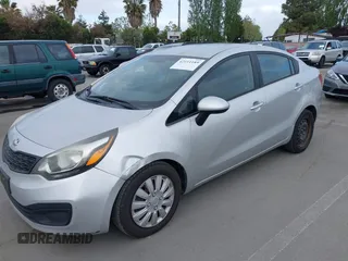 2014 Kia Rio LX with VIN KNADM4A3XE6363851, listed as a IAAI auction lot 42111189 with 144,122 mi miles and . Bid and sale history available at DreamBid. Image 6.
