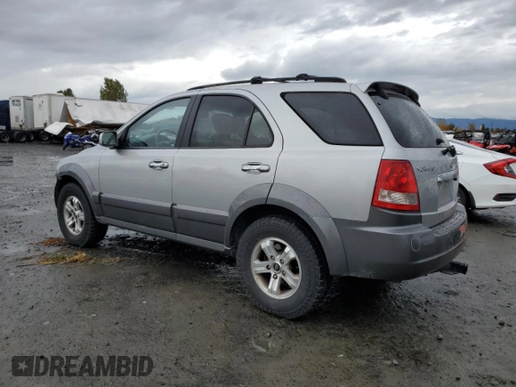 2003 Kia Sorento LX z VIN KNDJC733335030322, wystawiony jako Copart lot #77607974 z przebiegiem 109 777 mil mil oraz Szkoda całkowita • Salvage title. Historia ofert i sprzedaży dostępna na DreamBid. Obrazek 2.