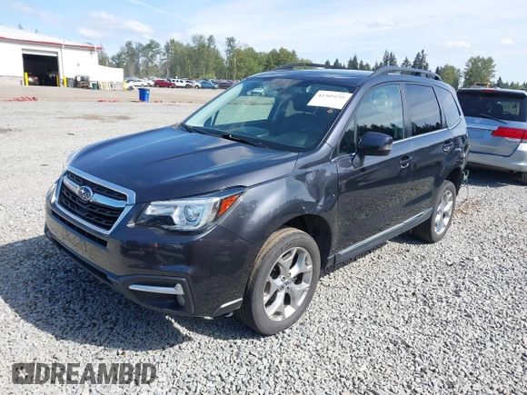 2018 Subaru Forester Touring with VIN JF2SJAWC6JH608722, listed as a IAAI auction lot 42309259 with 93,426 mi miles and . Bid and sale history available at DreamBid. Image 18.