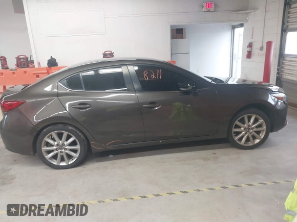 2017 Mazda 3 Touring z VIN JM1BN1V78H1142186, wystawiony jako IAAI lot #42508211 z przebiegiem 109 082 mil mil oraz . Historia ofert i sprzedaży dostępna na DreamBid. Obrazek 13.