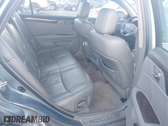 2010 Toyota Avalon XL with VIN 4T1BK3DB1AU363817, listed as a IAAI auction lot 41010053 with 259,106 mi miles and . Bid and sale history available at carsss.com. Image 8.