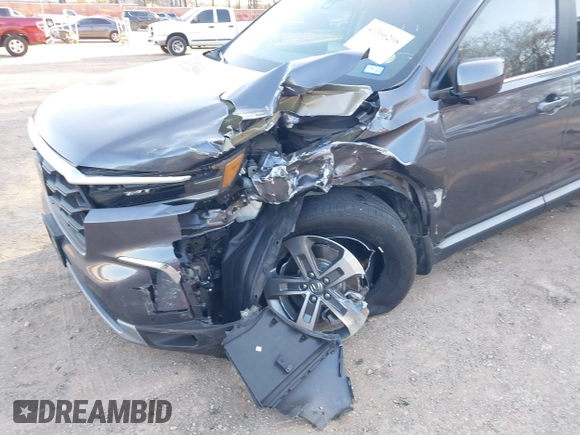 2023 Honda Pilot EX-L with VIN 5FNYG1H5XPB044829, listed as a IAAI auction lot 41396208 with 15,277 mi miles and . Bid and sale history available at DreamBid. Image 6.
