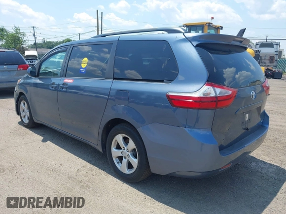 2015 Toyota Sienna LE AAS with VIN 5TDKK3DC1FS642029, listed as a IAAI auction lot 42618738 with 201,344 mi miles and . Bid and sale history available at DreamBid. Image 3.