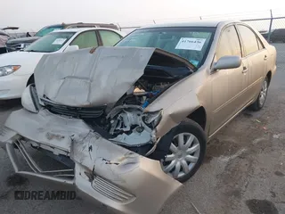 2005 Toyota Camry STD with VIN 4T1BE32K55U019844, listed as a IAAI auction lot 41766436 with 203,251 mi miles and . Bid and sale history available at DreamBid. Image 2.