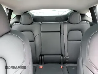 2023 Tesla Model Y Long Range with VIN 7SAYGDEE3PA151887, listed as a Copart auction lot 51459495 with 15,562 mi miles and Salvage Title. Bid and sale history available at DreamBid. Image 10.