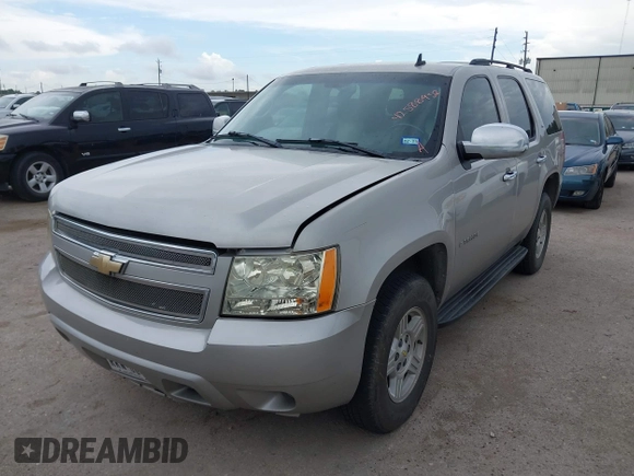2007 Chevrolet Tahoe LS with VIN 1GNFC13C57R417897, listed as a IAAI auction lot 42588952 with 212,919 mi miles and . Bid and sale history available at DreamBid. Image 2.
