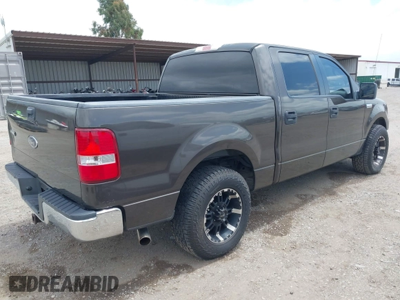 2005 Ford F-150 XLT with VIN 1FTPW12535KF05473, listed as a IAAI auction lot 42140281 with 163,023 mi miles. Bid and sale history available at carsss.com. Image 4.