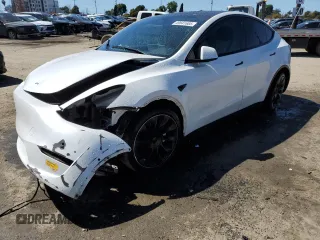 2022 Tesla Model Y Long Range z VIN 7SAYGDEEXNF455766, wystawiony jako Copart lot #49641685 z przebiegiem 51 142 mil mil oraz Szkoda całkowita • Salvage title. Historia ofert i sprzedaży dostępna na DreamBid. Obrazek 1.