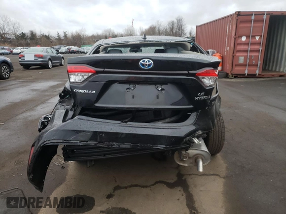2023 Toyota Corolla Hybrid LE with VIN JTDBDMHE2P3002183, listed as a Copart auction lot 50292785 with 7,065 mi miles and Salvage Title. Bid and sale history available at carsss.com. Image 6.