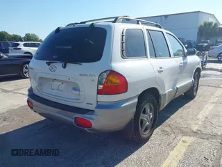 2004 Hyundai Santa Fe GLS with VIN KM8SC73D74U675555, listed as a IAAI auction lot 42021978 with 198,778 mi miles. Bid and sale history available at carsss.com. Image 4.