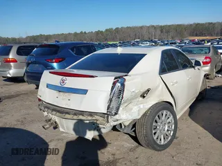 2011 Cadillac CTS Luxury z VIN 1G6DE5EY6B0118591, wystawiony jako IAAI lot #41486928 z przebiegiem 133 763 mil mil oraz . Historia ofert i sprzedaży dostępna na DreamBid. Obrazek 4.