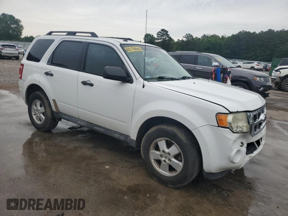 2012 Ford Escape XLT with VIN 1FMCU0D71CKA77294, listed as a Copart auction lot 55769595 with 256,238 mi miles and Salvage title. Bid and sale history available at DreamBid. Image 4.