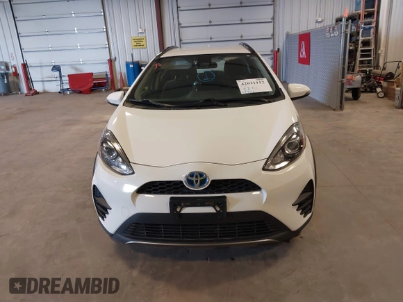 2018 Toyota Prius One with VIN JTDKDTB35J1599642, listed as a IAAI auction lot 42031112 with 58,801 mi miles and . Bid and sale history available at DreamBid. Image 12.