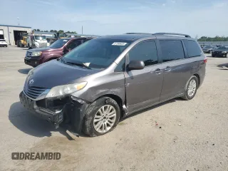 2015 Toyota Sienna XLE with VIN 5TDYK3DCXFS528136, listed as a Copart auction lot 57388835 with 260,384 mi miles and Salvage title. Bid and sale history available at DreamBid. Image 1.