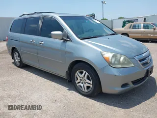 2007 Honda Odyssey EX-L z VIN 5FNRL387X7B026120, wystawiony jako IAAI lot #42382617 z przebiegiem 160 076 mil mil oraz . Historia ofert i sprzedaży dostępna na DreamBid. Obrazek 1.