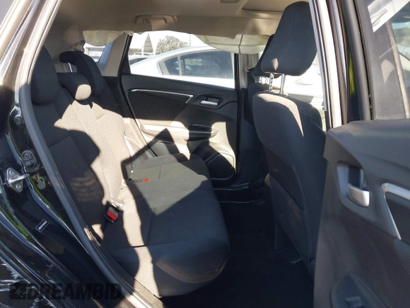 2016 Honda Fit EX with VIN JHMGK5H75GX006464, listed as a IAAI auction lot 41852218 with 30,990 mi miles and . Bid and sale history available at DreamBid. Image 8.