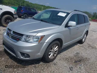 2014 Dodge Journey SXT z VIN 3C4PDCBB0ET133029, wystawiony jako IAAI lot #42434575 z przebiegiem 218 609 mil mil oraz . Historia ofert i sprzedaży dostępna na DreamBid. Obrazek 2.