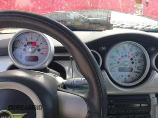 2006 MINI Hardtop with VIN WMWRC33556TK72619, listed as a IAAI auction lot 42328177 with 106,398 mi miles and . Bid and sale history available at DreamBid. Image 7.
