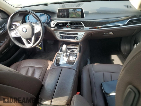 2018 BMW 7 Series 740i xDrive with VIN WBA7E4C54JGV23901, listed as a Copart auction lot 77322824 with 70,922 mi miles and Salvage Title. Bid and sale history available at carsss.com. Image 8.