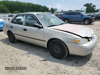 1999 Toyota Corolla VE with VIN 2T1BR12E4XC253867, listed as a Copart auction lot 63768395 with 164,195 mi miles and Salvage title. Bid and sale history available at DreamBid. Image 4.