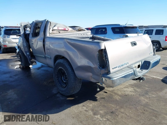 2001 Toyota Tundra SR5 with VIN 5TBRT34161S220253, listed as a IAAI auction lot 41598840 with 242,488 mi miles and . Bid and sale history available at carsss.com. Image 3.
