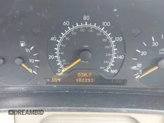 1999 Mercedes-Benz E-Class with VIN WDBJF82H3XX025608, listed as a IAAI auction lot 41606211 with 182,293 mi miles. Bid and sale history available at carsss.com. Image 7.