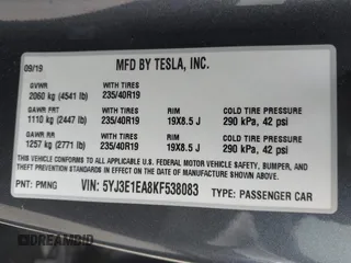 2019 Tesla Model 3 Mid Range with VIN 5YJ3E1EA8KF538083, listed as a IAAI auction lot 41891458 with 46,958 mi miles and . Bid and sale history available at carsss.com. Image 9.