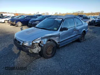 1997 Toyota Tercel CE z VIN JT2AC52L1V0227973, wystawiony jako Copart lot #77300554 z przebiegiem 301 799 mil mil oraz Szkoda całkowita • Salvage title. Historia ofert i sprzedaży dostępna na DreamBid. Obrazek 1.
