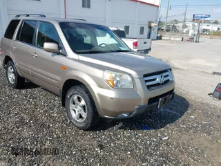 2007 Honda Pilot EX-L z VIN 5FNYF18657B013919, wystawiony jako IAAI lot #42074957 z przebiegiem 228 856 mil mil oraz . Historia ofert i sprzedaży dostępna na DreamBid. Obrazek 1.