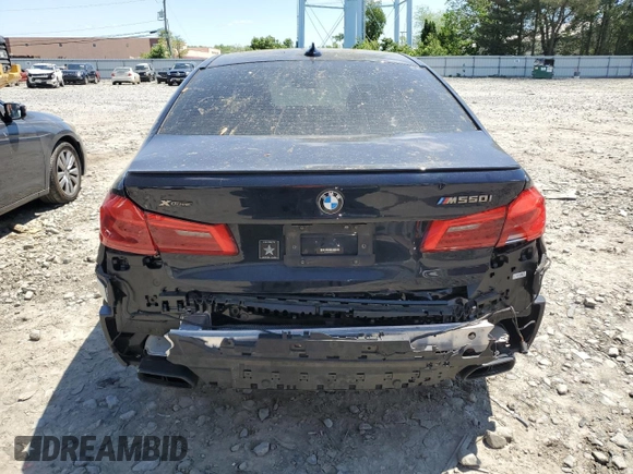 2018 BMW 5 Series M550i xDrive with VIN WBAJB9C56JB286479, listed as a Copart auction lot 57108645 with 71,782 mi miles and Salvage title. Bid and sale history available at DreamBid. Image 6.