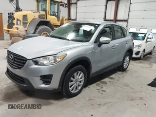 2016 Mazda CX-5 Sport with VIN JM3KE2BY2G0718434, listed as a IAAI auction lot 41961364 with 145,748 mi miles. Bid and sale history available at carsss.com. Image 2.
