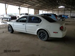 2001 Nissan Maxima GXE with VIN JN1CA31D41T809212, listed as a Copart auction lot 57845405 with 244,502 mi miles and Salvage title. Bid and sale history available at DreamBid. Image 2.