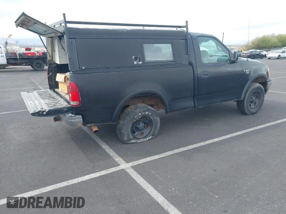 2000 Ford F-150 XL with VIN 2FTRF18W1YCA42685, listed as a IAAI auction lot 41743378 with 211,072 mi miles and . Bid and sale history available at DreamBid. Image 4.