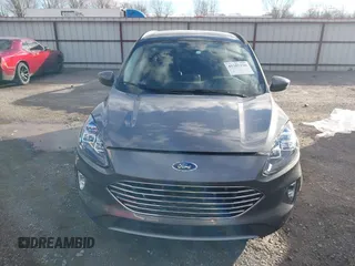 2021 Ford Escape Titanium Hybrid z VIN 1FMCU0DZ0MUB00944, wystawiony jako IAAI lot #41202146 z przebiegiem 52 458 mil mil oraz . Historia ofert i sprzedaży dostępna na DreamBid. Obrazek 12.