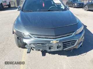 2018 Chevrolet Malibu LT z VIN 1G1ZD5STXJF239806, wystawiony jako IAAI lot #42175966 z przebiegiem 160 282 mil mil oraz . Historia ofert i sprzedaży dostępna na DreamBid. Obrazek 6.